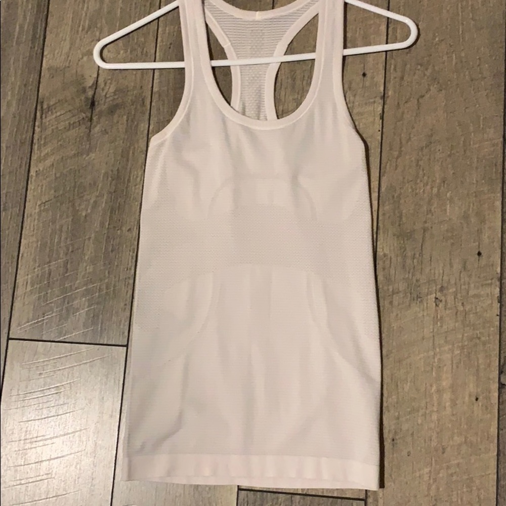 White Lululemon racerback tank top.